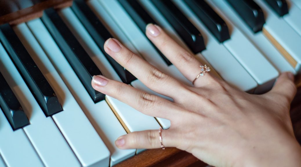 Naked Piano Player Hand
